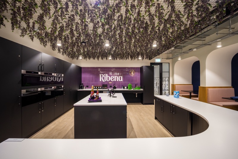 The Ribena kitchen beneath a ceiling of blackcurrant foliage
