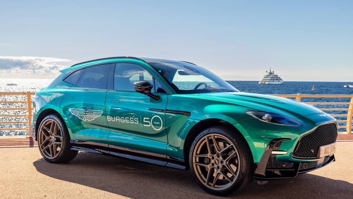 An Aston Martin DBX in Burgess livery on the Monaco waterfront