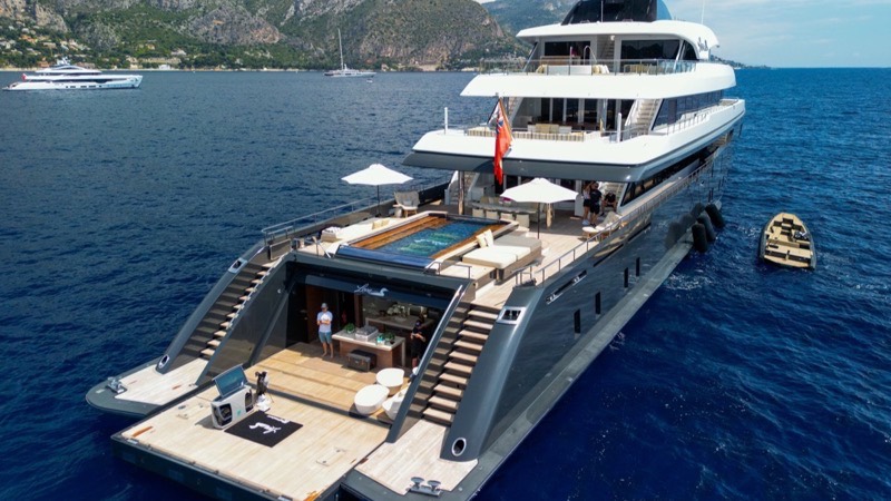 M/Y Loon at anchor on the Riviera with her beach club open